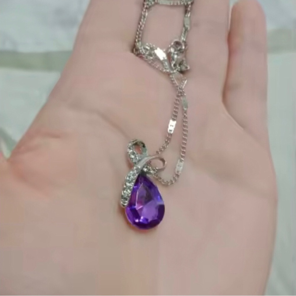 Elegant Sterling Silver Necklace with Purple Teardrop Pendant